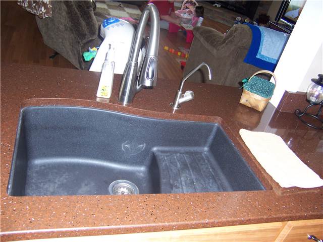 Quartz countertop with a composite undermount sink